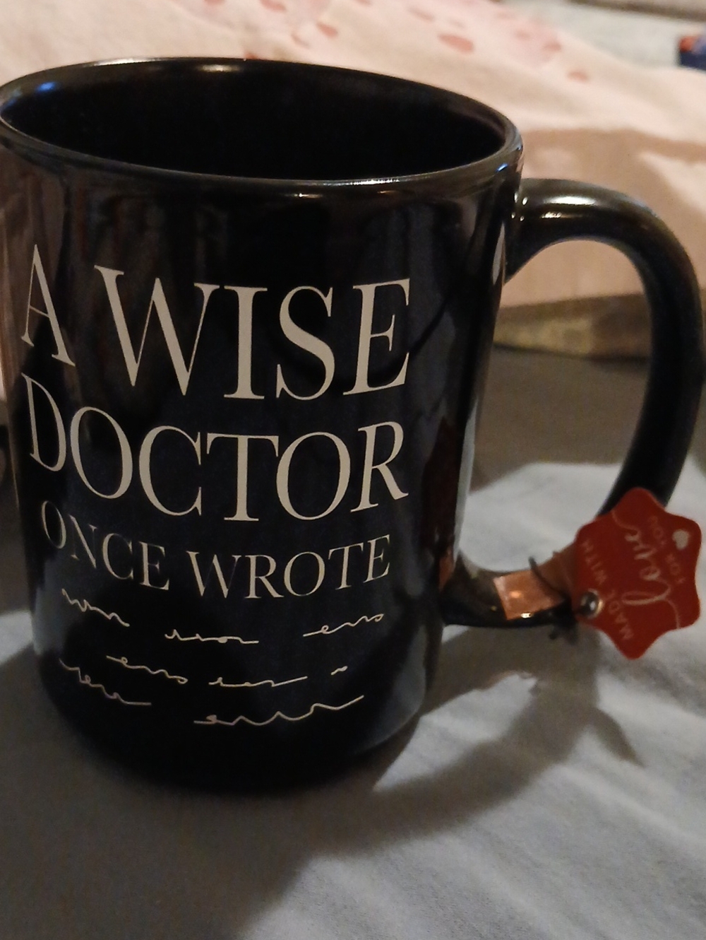 Black 'A Wise Doctor Once Wrote' Ceramic Mug -